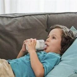 Omron MicroAIR NE-U100 Mesh Nebulizer -Home Sale Store omron young boy on sofa1